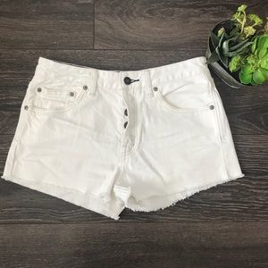 FREE PEOPLE high rise button up white jean shorts